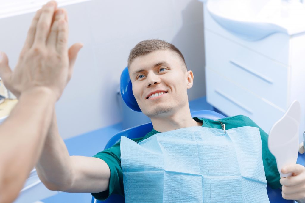 Paciente dental feliz